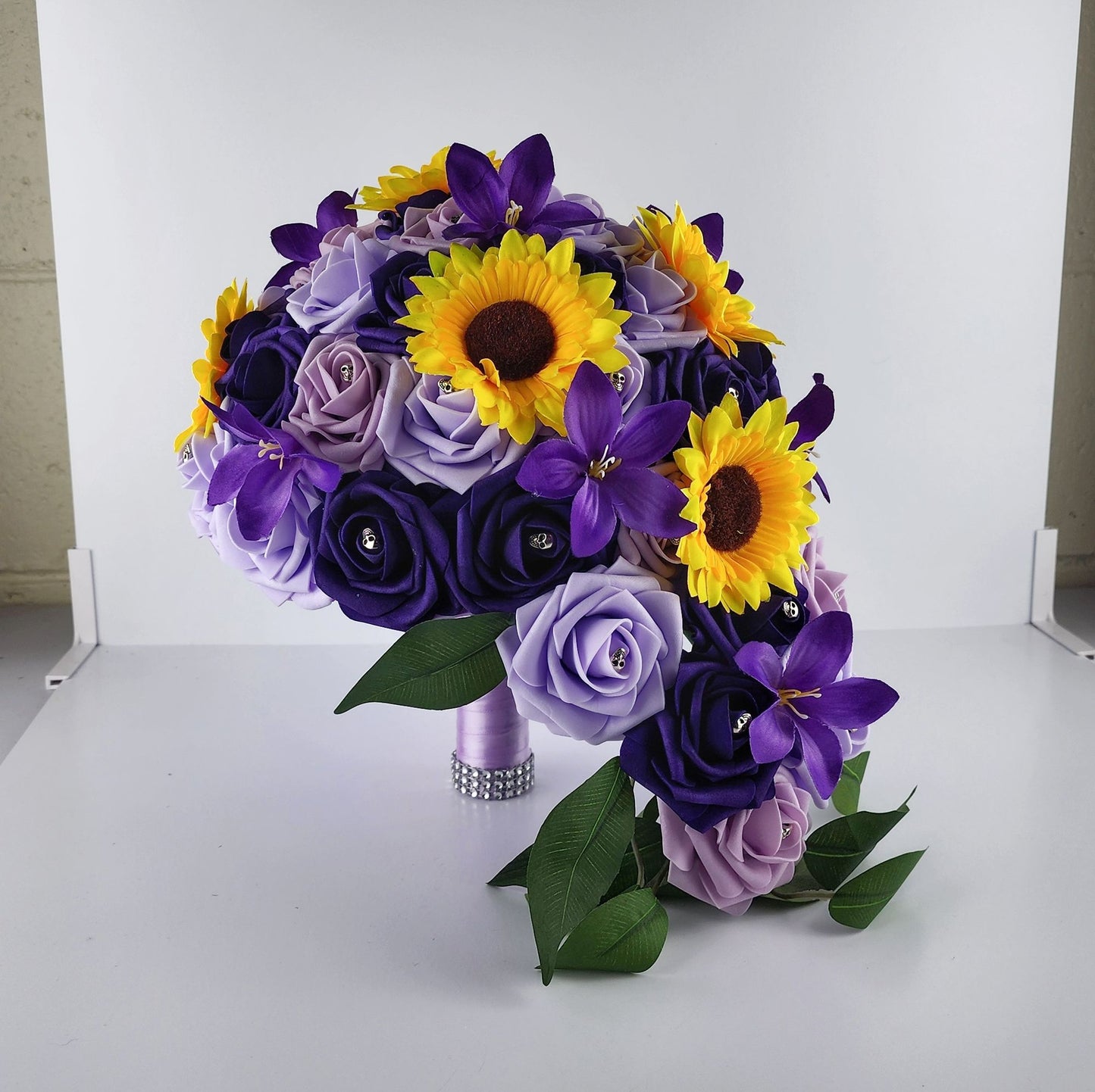 Gothic Skull Cascading Wedding Bouquet Made With Lilac, Lavender, and Purple Roses.