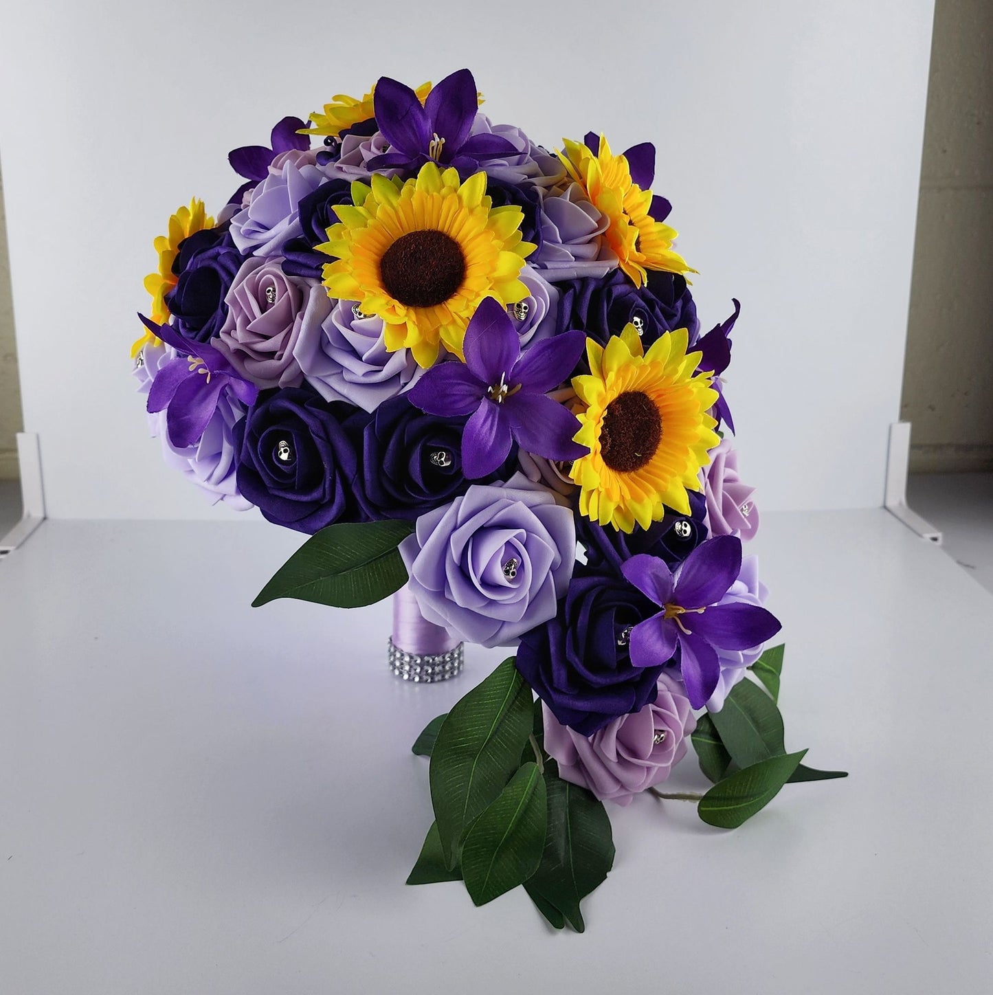 Gothic Skull Cascading Wedding Bouquet Made With Lilac, Lavender, and Purple Roses.