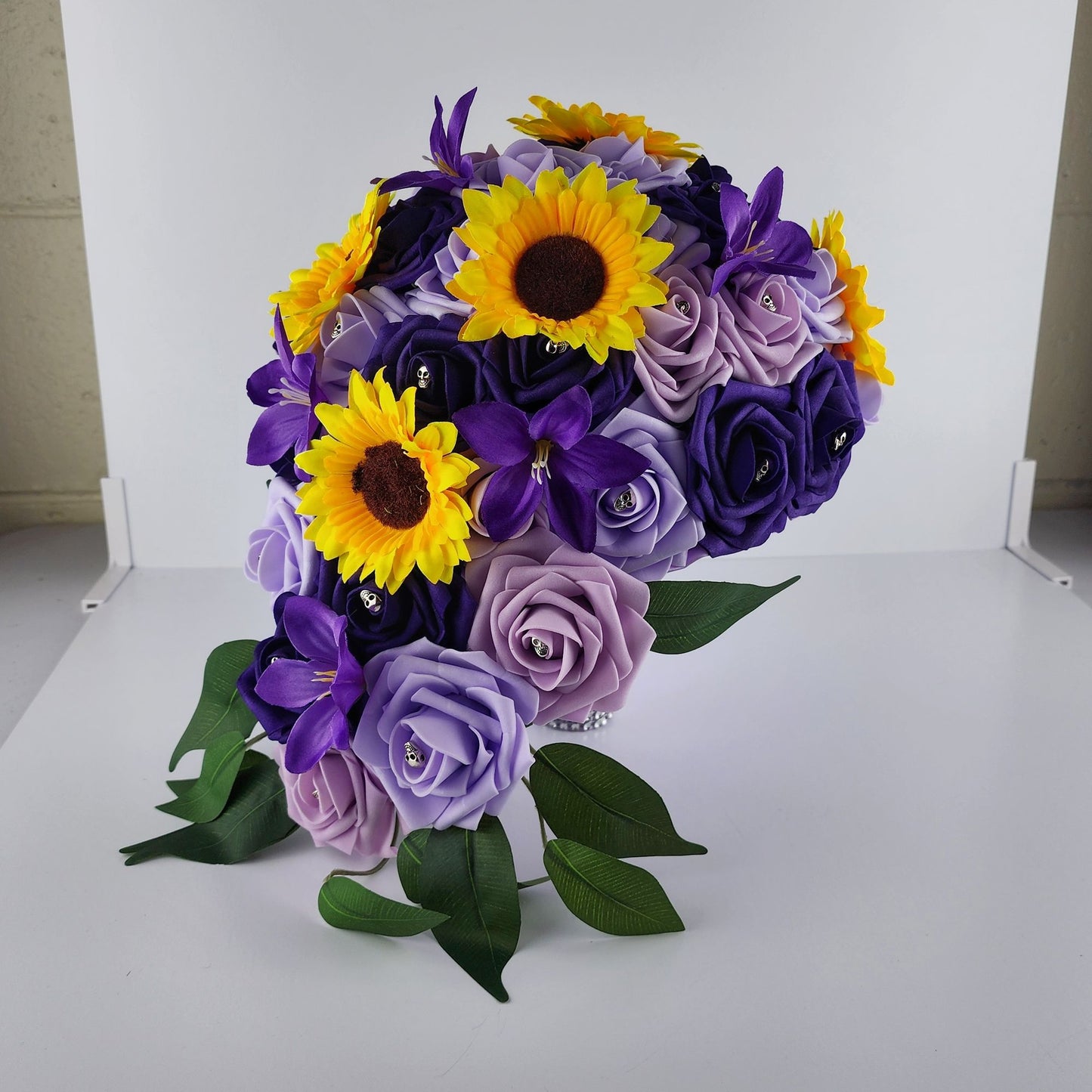 Gothic Skull Cascading Wedding Bouquet Made With Lilac, Lavender, and Purple Roses.