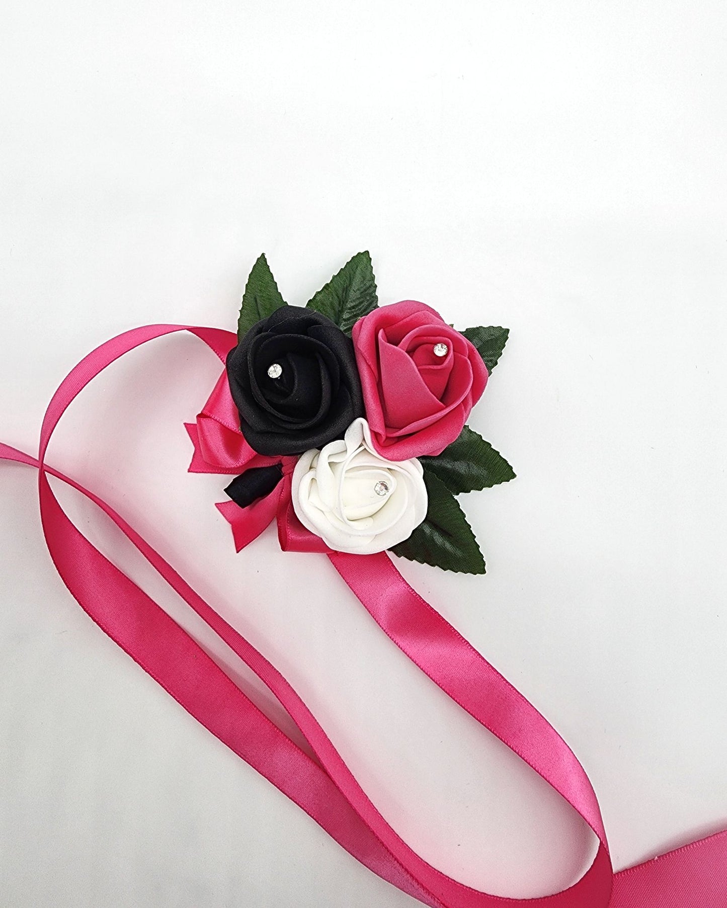 Hot Pink, White, and Black Boutonnieres and Corsages