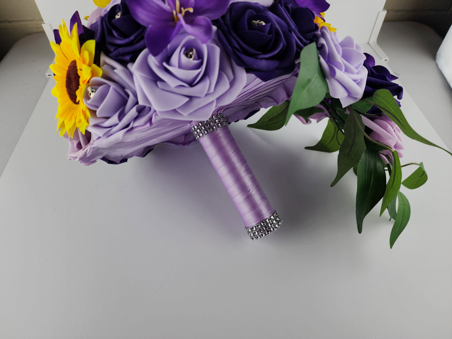 Gothic Skull Cascading Wedding Bouquet Made With Lilac, Lavender, and Purple Roses.