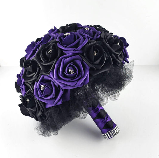 Gothic Skull Dark Purple and Black Wedding Bouquet made with real touch roses. handle is made up of purple and black ribbon in a french twist style. 