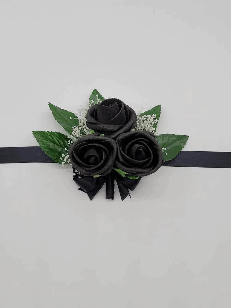 all black wrist corsage with babies breath