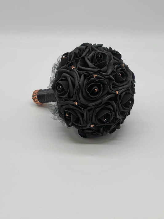 Black and rose gold butterfly bouquet with black tulle and black satin ribbon. 