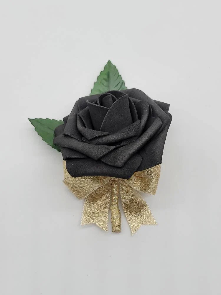 black and gold boutonniere made with real touch roses