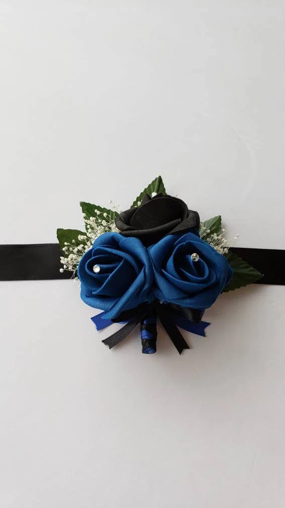 black and royal blue roses with babies breath
