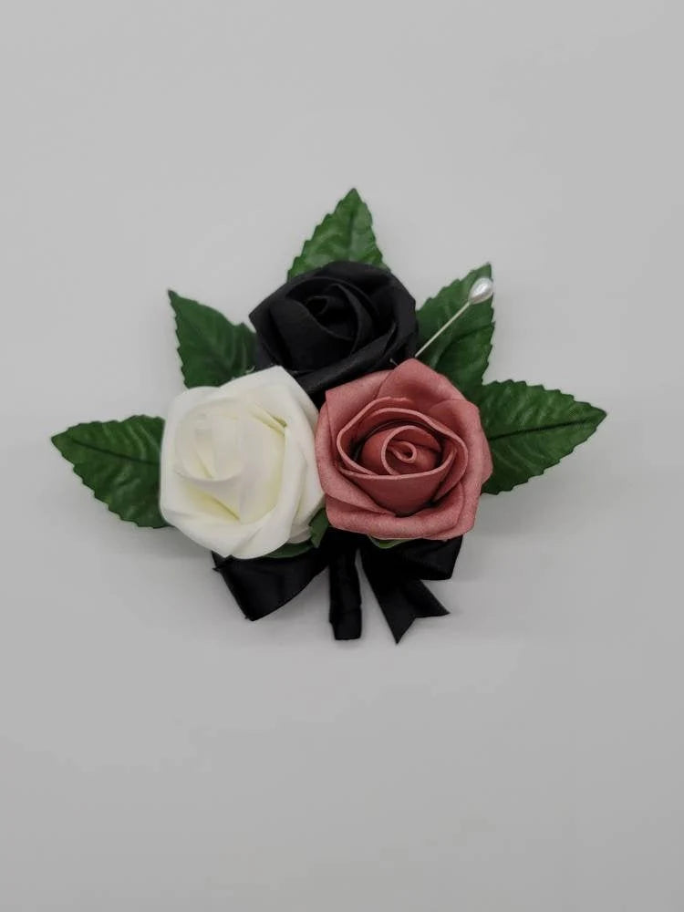 black ivory and dusty rose pin on corsage