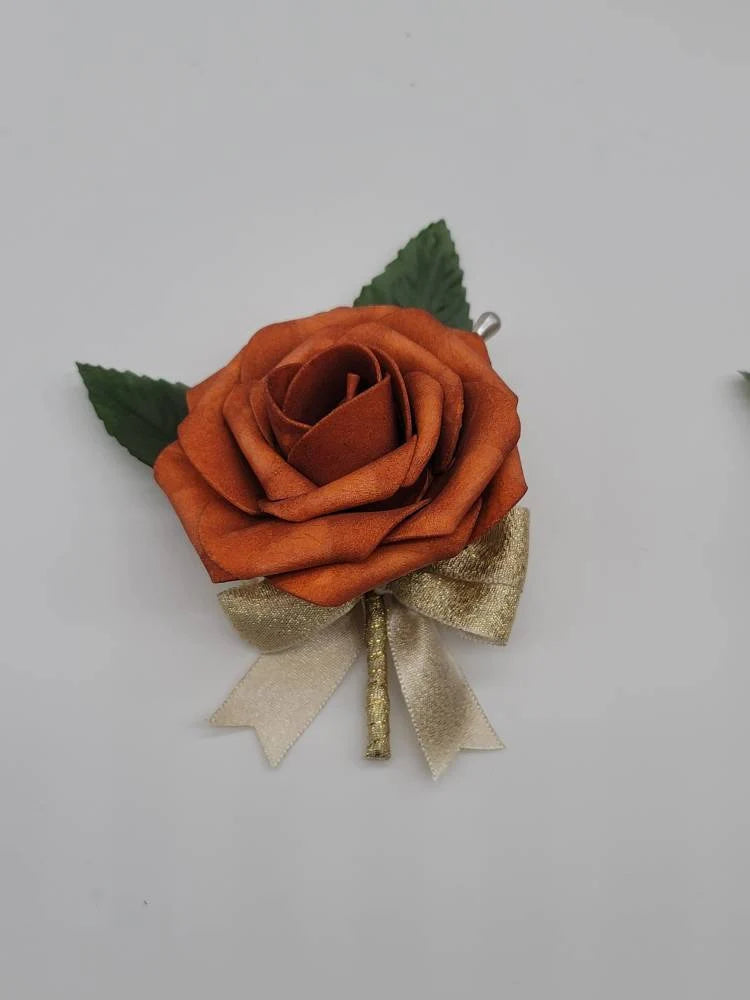 burnt orange and gold boutonniere