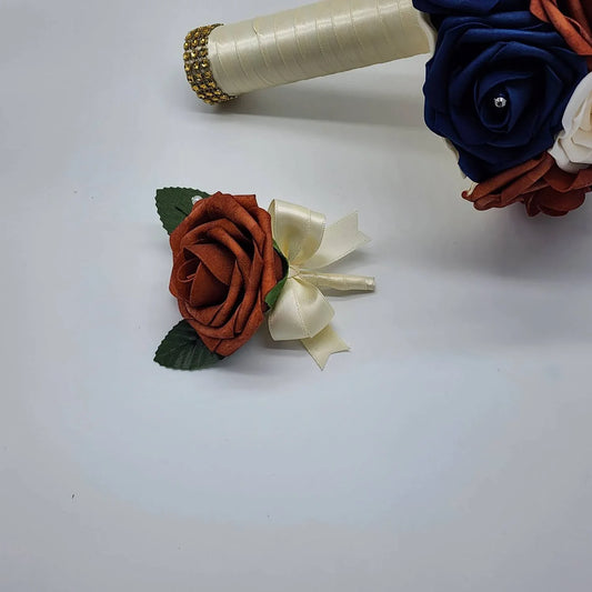 burnt orange and ivory boutonniere