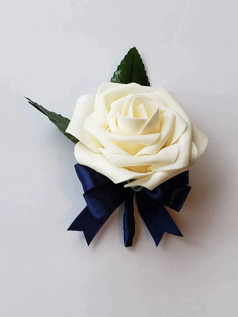 cream and navy boutonniere