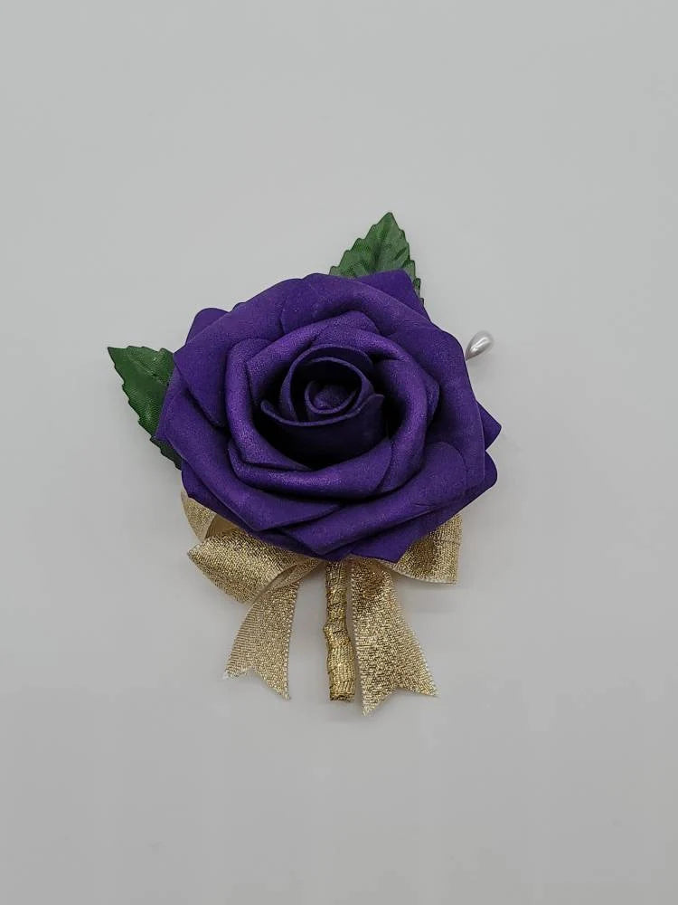 purple and gold boutonniere