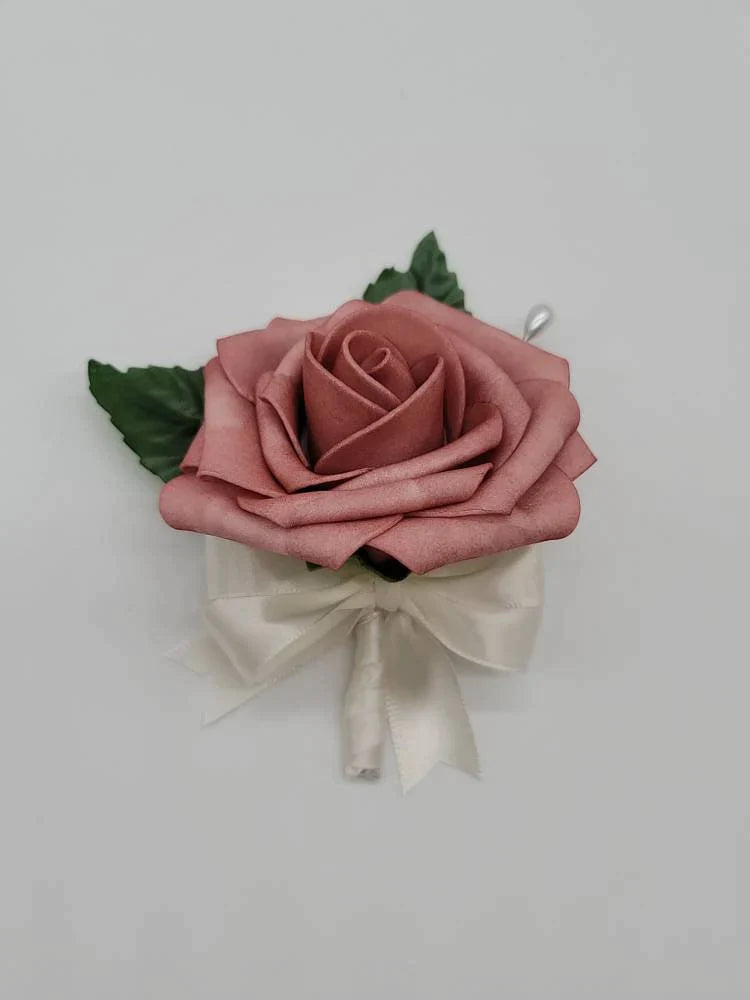 dusty rose and white boutonniere