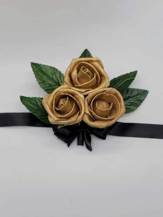 gold and black wrist corsage