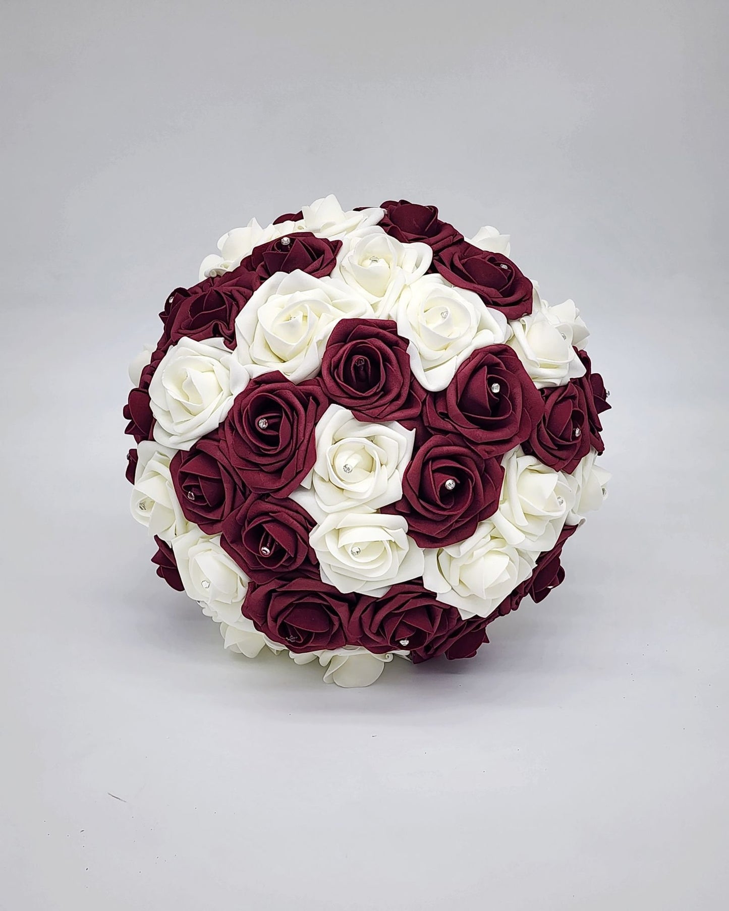 Front viewof Bridal bouquet. Shoesround shape