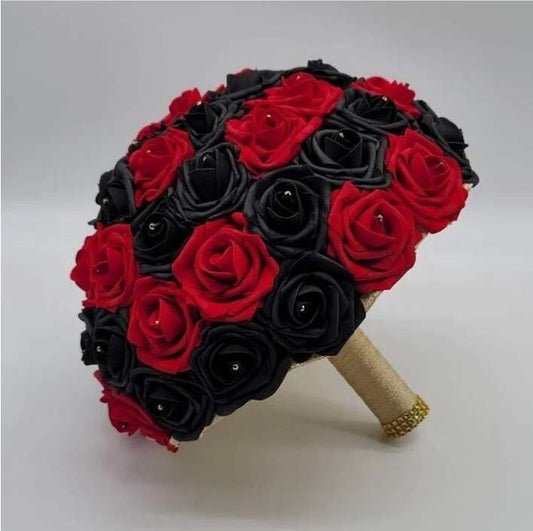 Red and Black wedding bouquet made with real touch roses. Rhinestones are in the center of every rose. handle is made up of gold ribbon and finished with gold bling wrap. 