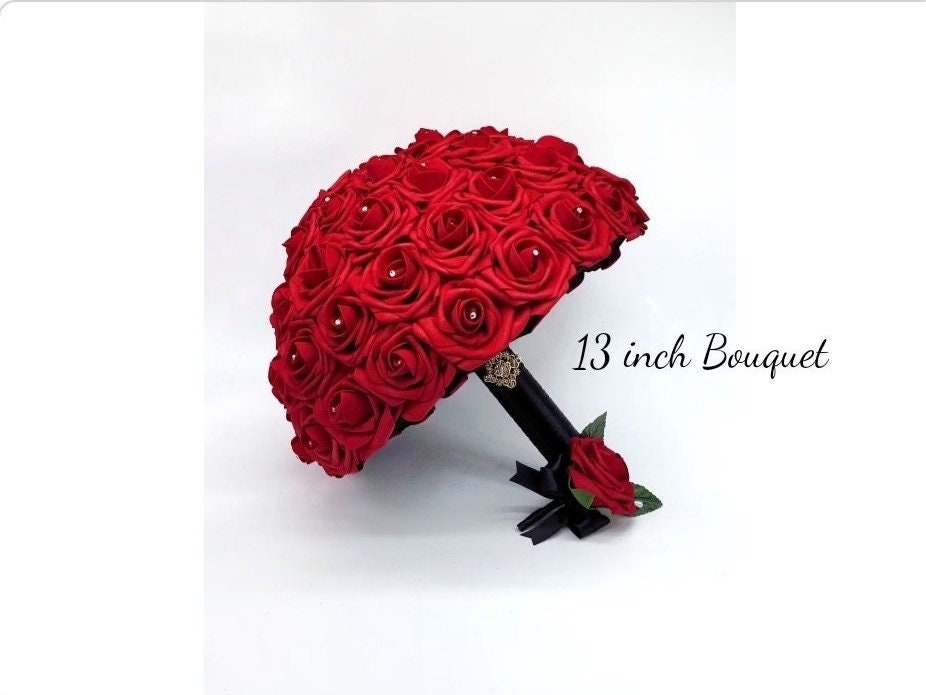 Red rose wedding bouquet and red boutonniere set. 