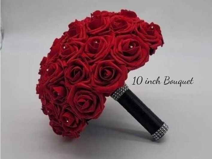 10-inch bridal bouquet with red roses and black satin ribbon handle.