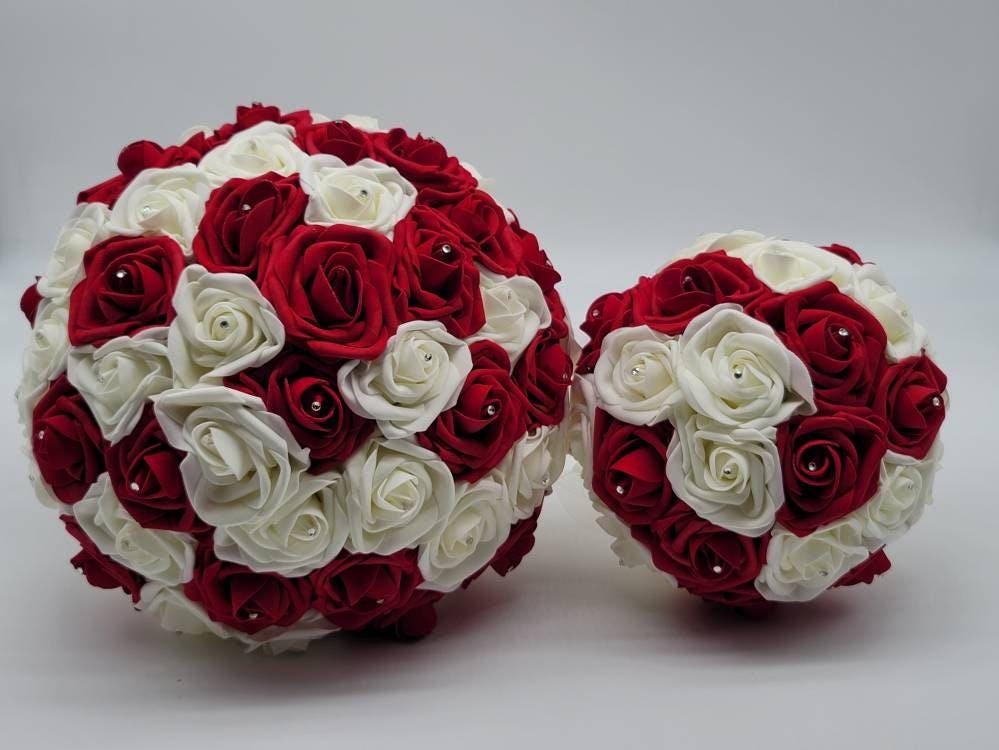 Front view of our 10 inch and 8 inch bouquets with red and ivory flowers. Rhinestones on every rose. 