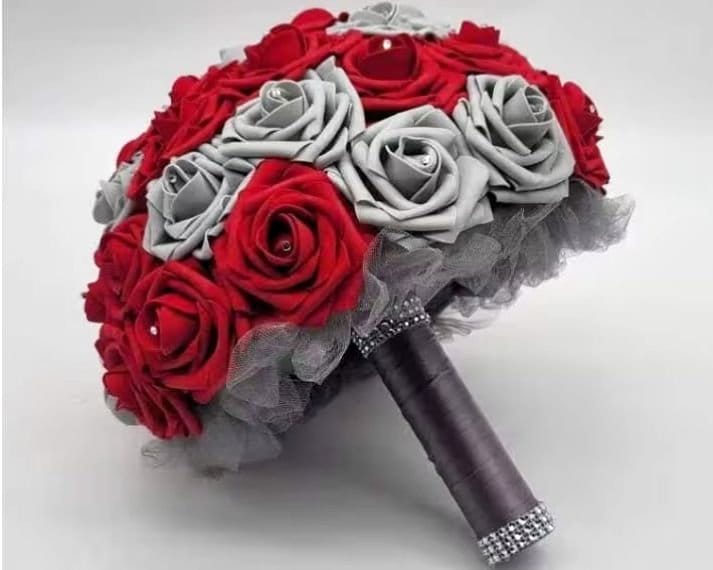 Red and Gray wedding bouquet made by real touch roses. Rhinestones are in the center of every rose. Handle is made up of gray tulle, gray satin ribbon, and finished with silver bling wrap. 