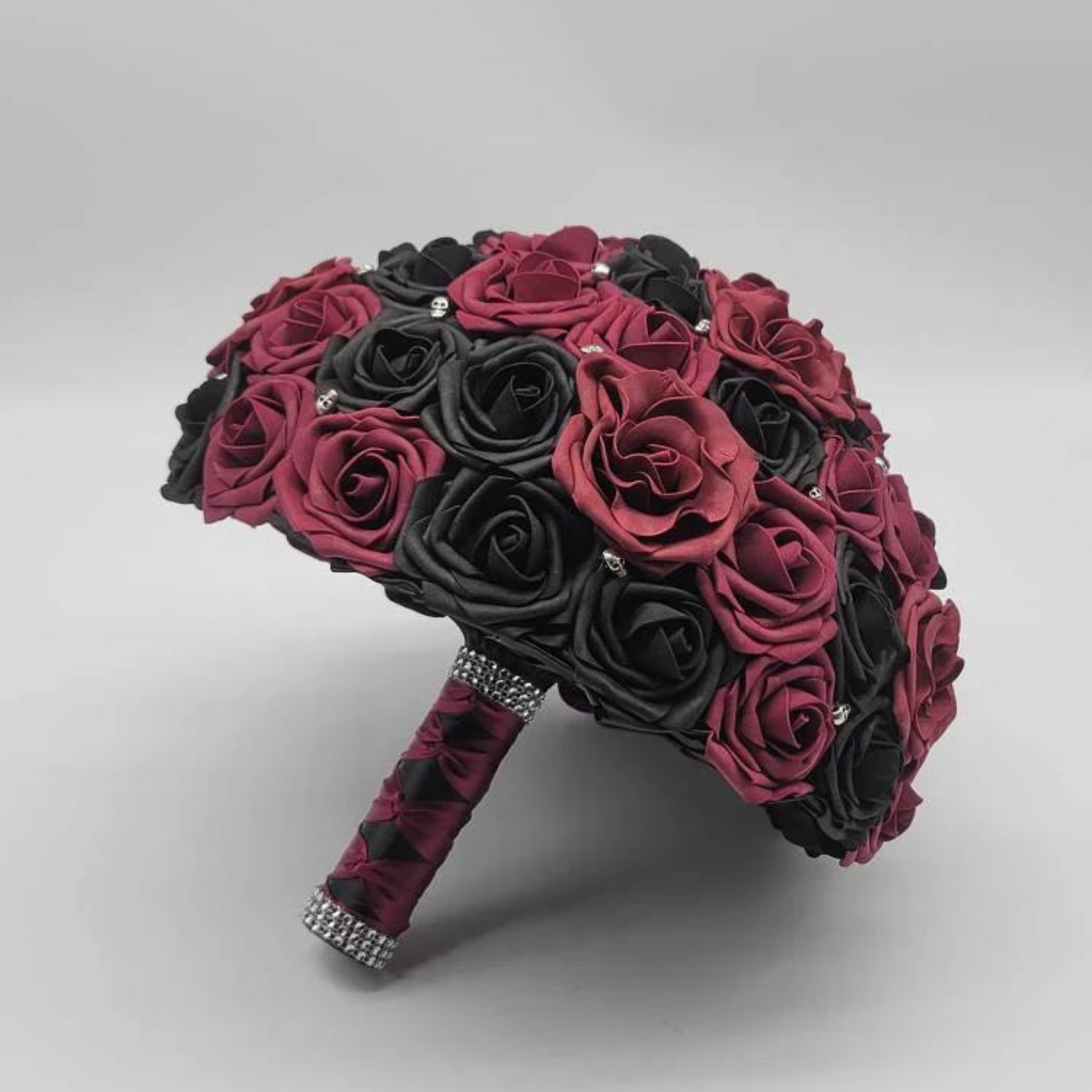 burgundy and black bridal bouquet with silver skulls