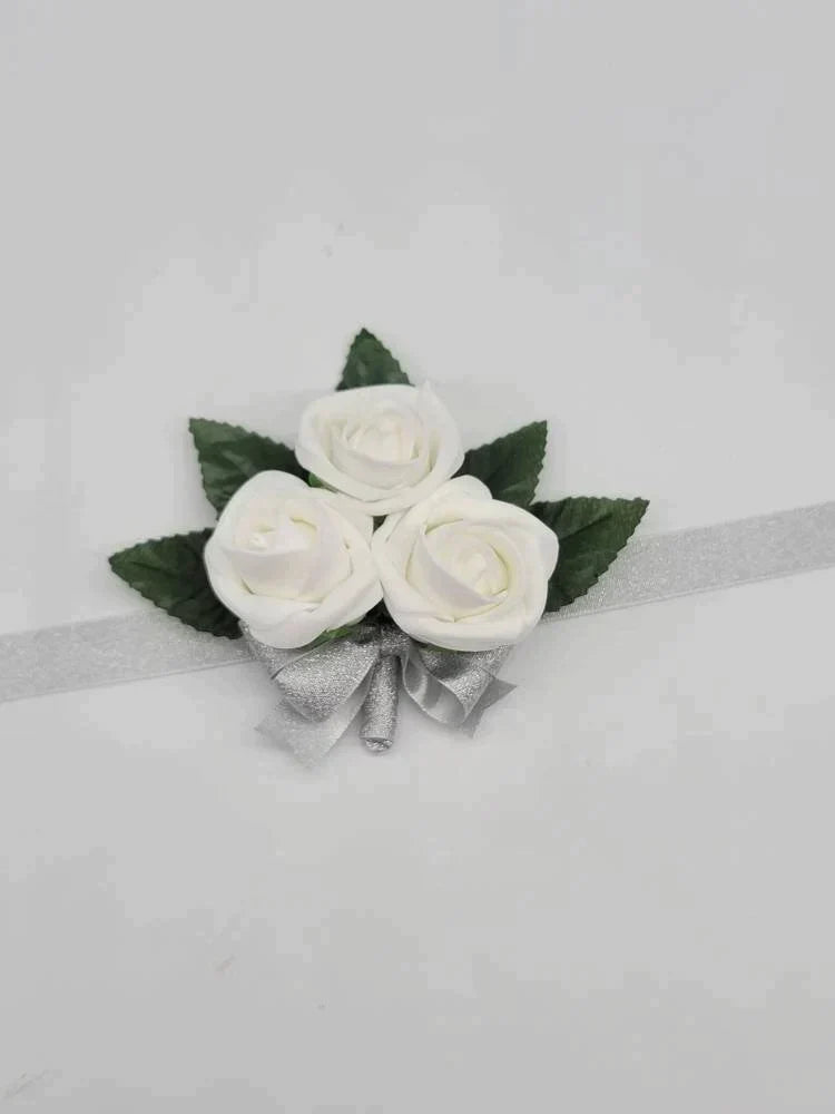 White and Silver Boutonnieres and Corsages