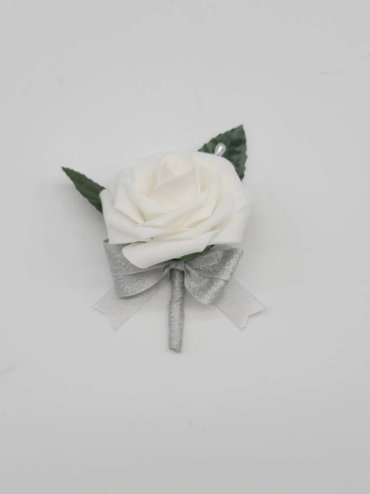 White and Silver Boutonnieres and Corsages